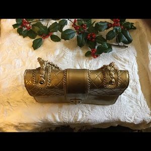 Vintage Gold CHANEL purse.